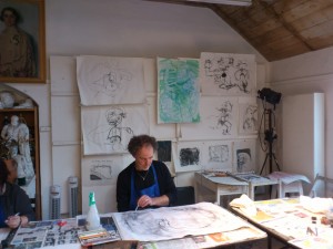 A student with some of his drawings